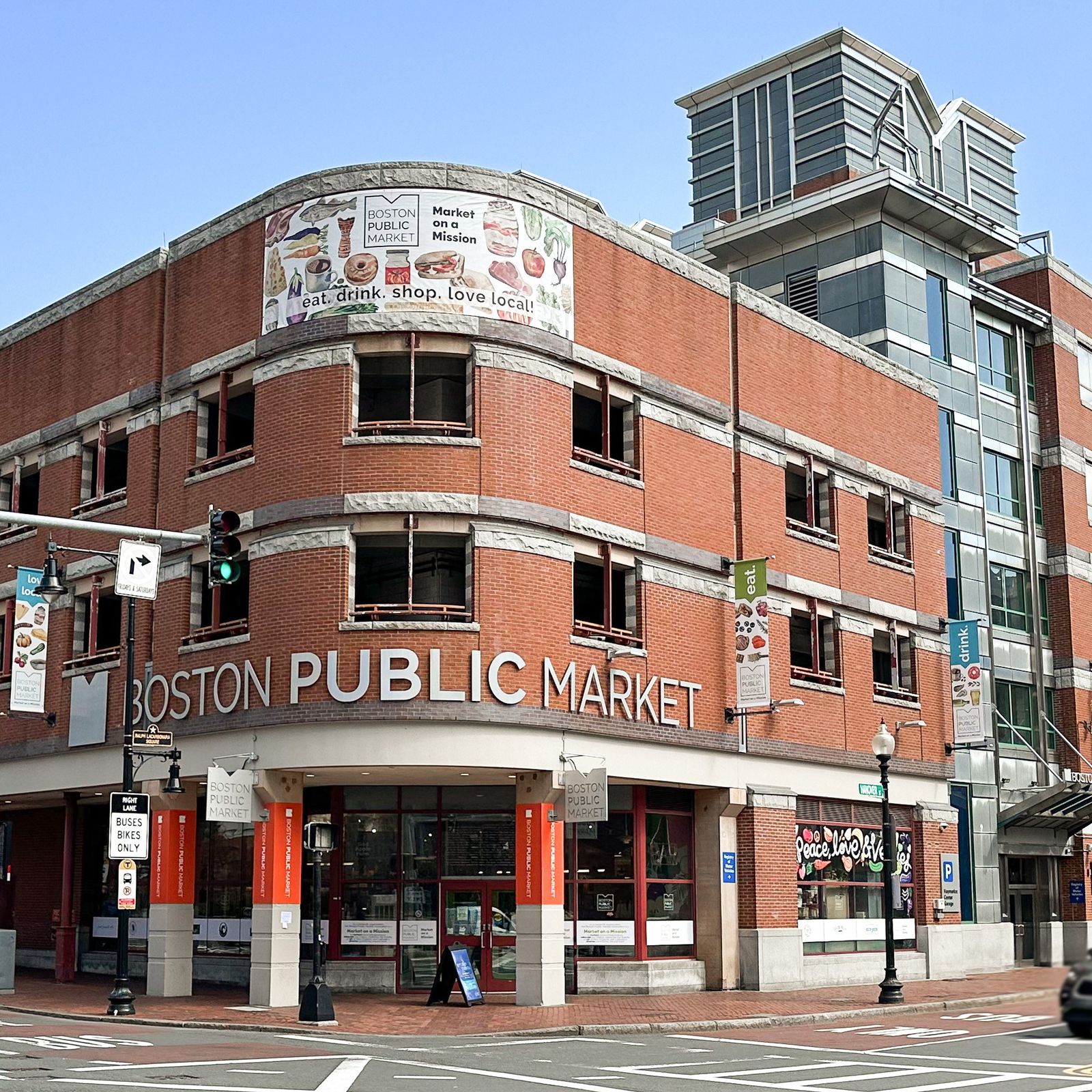Corner brick exterior of Boston Public Market with its name across the upper facade