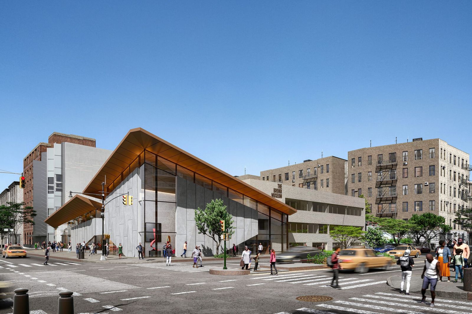 Exterior of the Bronx Museum of the Arts with its angled wooden-lined roof on a street corner