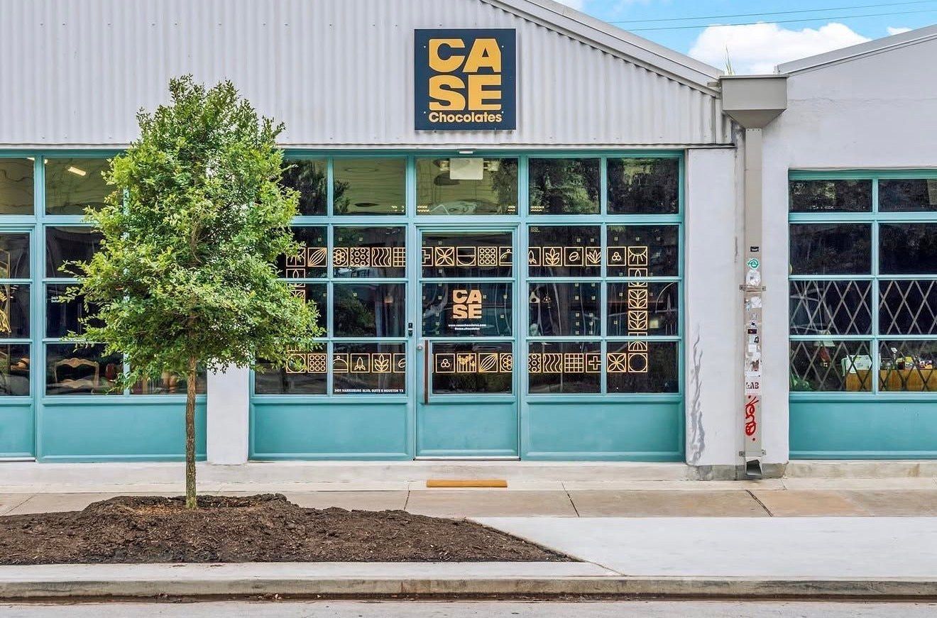 The shop's teal-framed storefront with a CASE Chocolates sign above large windows