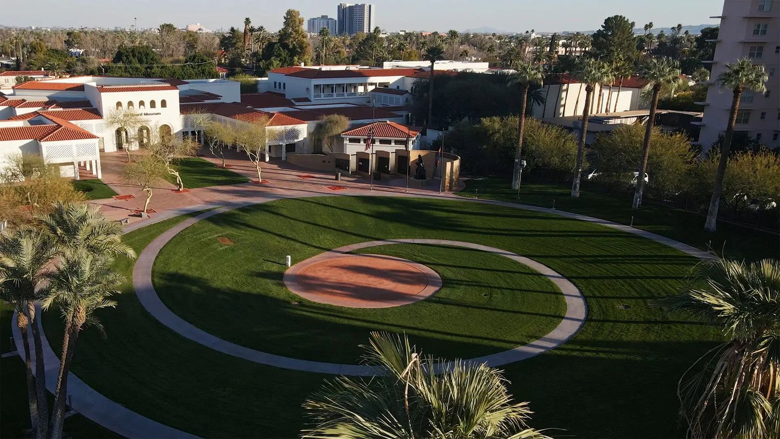 Aerial view of the Heard Museum's courtyard lawn and red-roofed buildings
